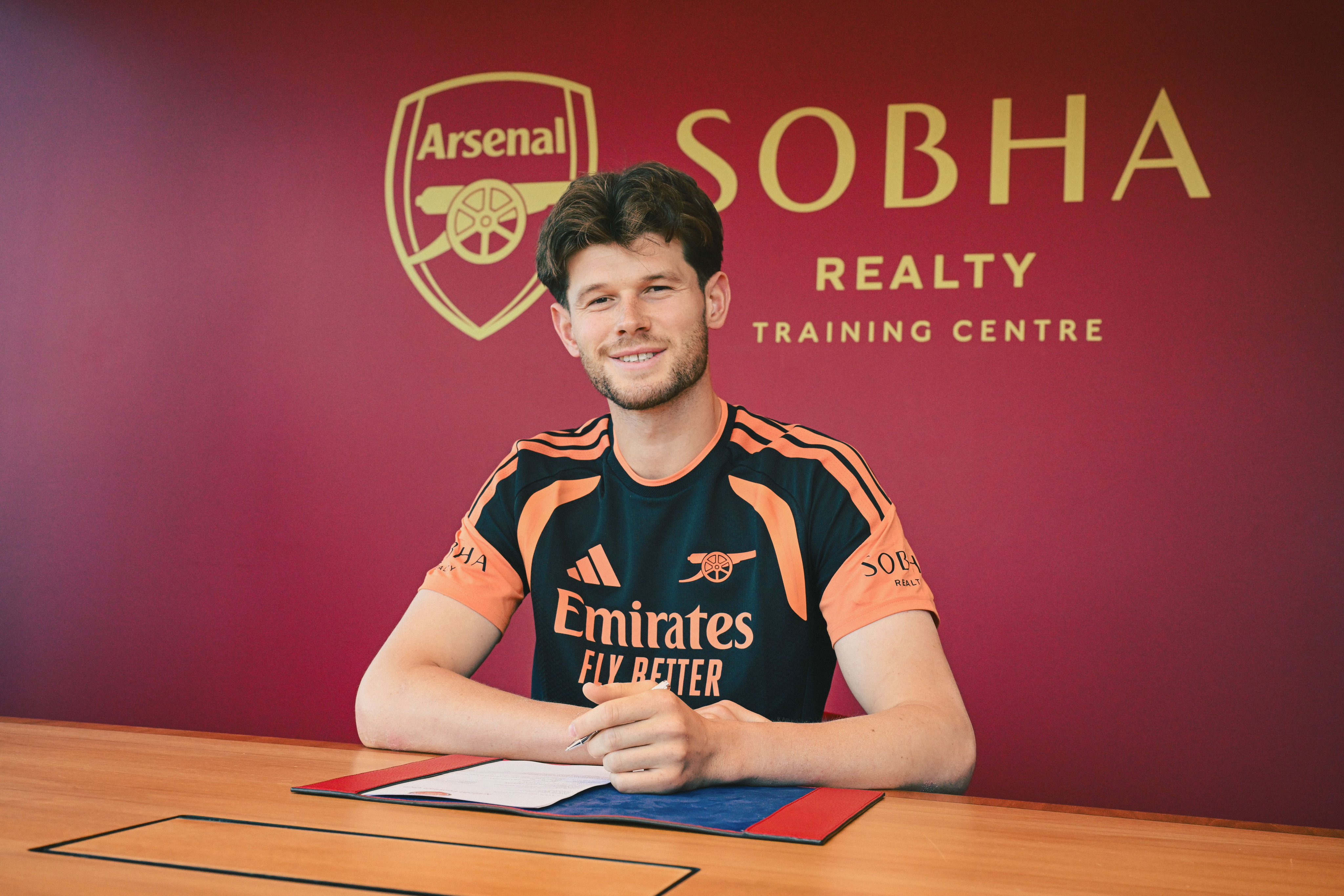 Illan Meslier signs his Arsenal contract at Sobha Realty Training Centre